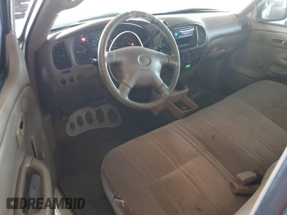 2002 Toyota Tundra z VIN 5TBJN32142S303241, wystawiony jako Copart lot #64789225 z przebiegiem 216 962 mil mil oraz Czysty tytuł • Clean title. Historia ofert i sprzedaży dostępna na DreamBid. Obrazek 8.