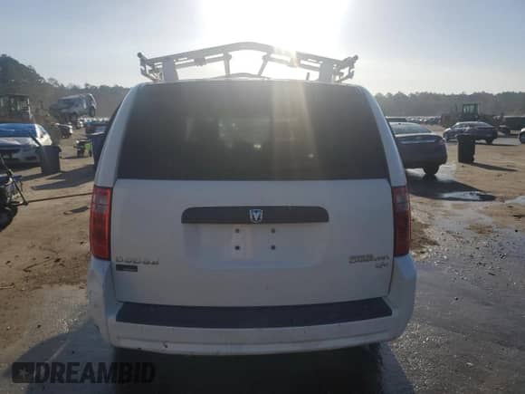 2009 Dodge Grand Caravan Cargo with VIN 2D4HN11E09R685028, listed as a Copart auction lot 77095054 with 240,140 mi miles and Salvage title. Bid and sale history available at DreamBid. Image 6.