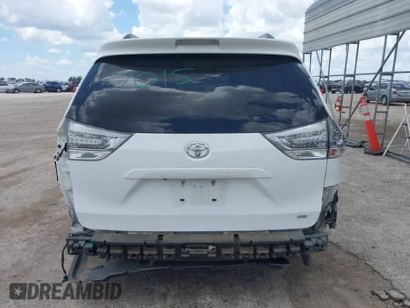 2015 Toyota Sienna SE with VIN 5TDXK3DC9FS669405, listed as a IAAI auction lot 42590910 with 82,127 mi miles and . Bid and sale history available at DreamBid. Image 17.