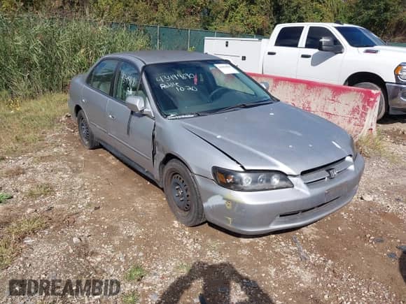 2002 Honda Accord LX with VIN 1HGCG56412A152321, listed as a IAAI auction lot 43494690 with 238,282 mi miles and . Bid and sale history available at DreamBid. Image 1.