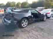 2019 Chevrolet Camaro 1LT z VIN 1G1FB3DS7K0116843, wystawiony jako IAAI lot #43158590 z przebiegiem 135 841 mil mil oraz . Historia ofert i sprzedaży dostępna na DreamBid. Obrazek 4.