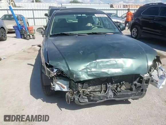 2001 Hyundai Sonata GLS z VIN KMHWF35V11A485934, wystawiony jako Copart lot #69853585 z przebiegiem 120 924 mil mil oraz Szkoda całkowita • Salvage title. Historia ofert i sprzedaży dostępna na DreamBid. Obrazek 14.