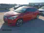 2012 Hyundai Veloster w/Gray Int z VIN KMHTC6AD0CU074696, wystawiony jako IAAI lot #43383748 z przebiegiem 140 707 mil mil oraz . Historia ofert i sprzedaży dostępna na DreamBid. Obrazek 2.