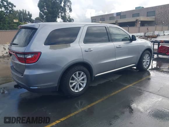 2014 Dodge Durango SXT with VIN 1C4RDHAG6EC483506, listed as a IAAI auction lot 43367759 with 214,899 mi miles and . Bid and sale history available at DreamBid. Image 4.