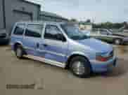 1993 Dodge Caravan with VIN 2B4GH2533PR287787, listed as a Copart auction lot 71940684 with 107,939 mi miles and Salvage title. Bid and sale history available at DreamBid. Image 4.
