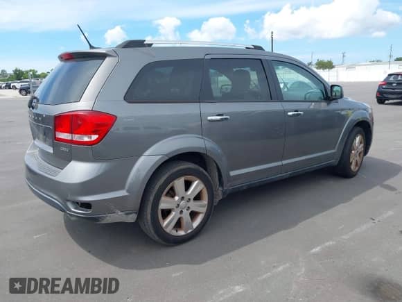 2012 Dodge Journey Crew with VIN 3C4PDCDG3CT207176, listed as a IAAI auction lot 43242158 with 173,632 mi miles and . Bid and sale history available at DreamBid. Image 4.