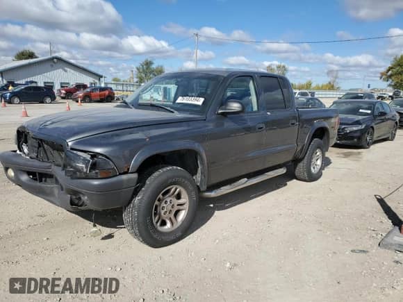 2003 Dodge Dakota Sport with VIN 1D7HG38X03S227575, listed as a Copart auction lot 76103394 with 109,796 mi miles and Salvage title. Bid and sale history available at DreamBid. Image 1.