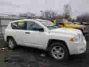 2007 Jeep Compass Sport with VIN 1J8FT47W17D212145, listed as a Copart auction lot 52424795 with 189,310 mi miles and Salvage title. Bid and sale history available at DreamBid. Image 4.