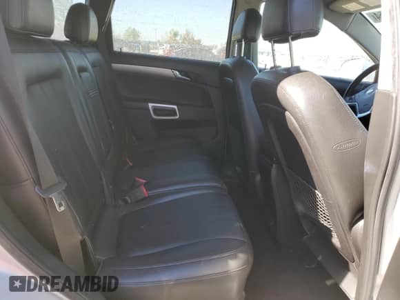 2012 Chevrolet Captiva Sport LTZ z VIN 3GNFL4E56CS594174, wystawiony jako Copart lot #74492554 z przebiegiem 129 625 mil mil oraz Czysty tytuł • Clean title. Historia ofert i sprzedaży dostępna na DreamBid. Obrazek 11.