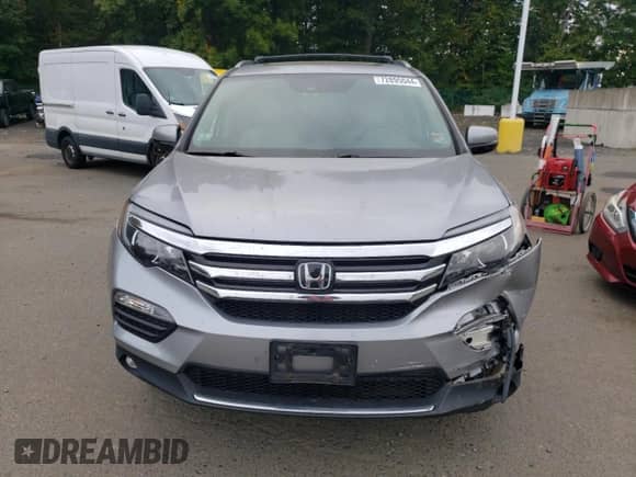 2016 Honda Pilot Touring with VIN 5FNYF6H94GB095794, listed as a Copart auction lot 72895044 with 102,246 mi miles and Salvage title. Bid and sale history available at DreamBid. Image 5.