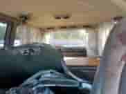 2002 Chevrolet Astro z VIN 1GNEL19X22B109349, wystawiony jako Copart lot #71454905 z przebiegiem 144 417 mil mil oraz Szkoda całkowita • Salvage title. Historia ofert i sprzedaży dostępna na DreamBid. Obrazek 10.