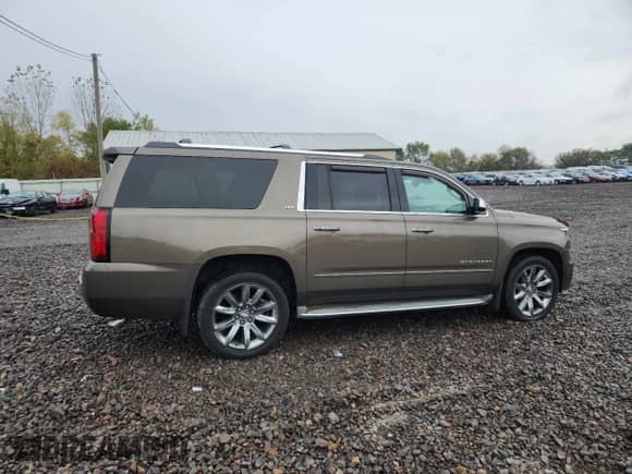 2015 Chevrolet Suburban LTZ с VIN 1GNSKKKC9FR516827, выставлен на аукционе Copart как лот 85957475 с пробегом 125 194 миль миль и Чистый • Clean title. История ставок и продаж доступна на DreamBid. Изображение 3.