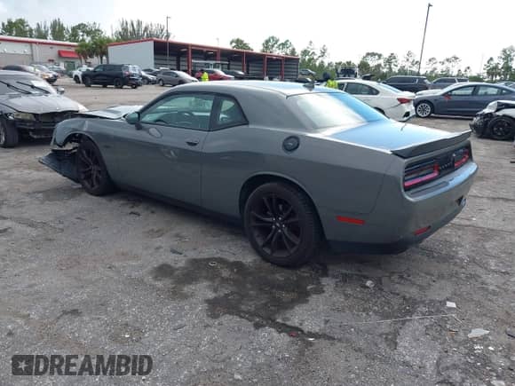 2018 Dodge Challenger T/A with VIN 2C3CDZBTXJH311594, listed as a IAAI auction lot 43202742 with 76,854 mi miles and . Bid and sale history available at DreamBid. Image 3.