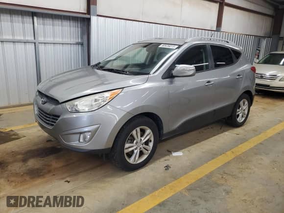 2013 Hyundai Tucson Limited z VIN KM8JU3AC7DU572809, wystawiony jako Copart lot #90926015 z przebiegiem 178 571 mil mil oraz Czysty tytuł • Clean title. Historia ofert i sprzedaży dostępna na DreamBid. Obrazek 1.