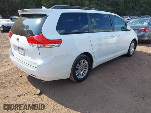 2011 Toyota Sienna XLE AAS with VIN 5TDYK3DC9BS132502, listed as a IAAI auction lot 43180013 with 212,756 mi miles and . Bid and sale history available at DreamBid. Image 4.