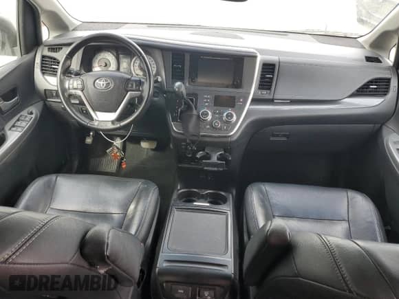 2015 Toyota Sienna SE with VIN 5TDXK3DC8FS656354, listed as a Copart auction lot 86177875 with 192,471 mi miles and Salvage title. Bid and sale history available at DreamBid. Image 8.