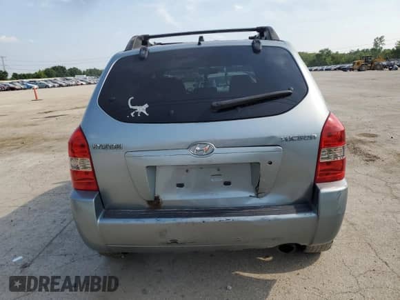 2005 Hyundai Tucson GL z VIN KM8JM12B75U180957, wystawiony jako Copart lot #62412015 z przebiegiem 222 710 mil mil oraz Szkoda całkowita • Salvage title. Historia ofert i sprzedaży dostępna na DreamBid. Obrazek 6.