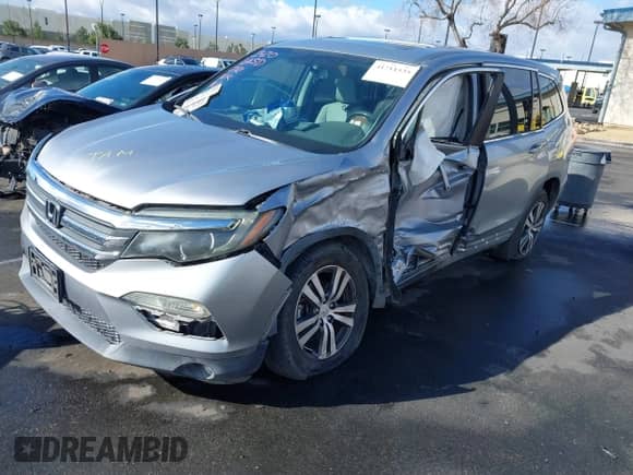 2017 Honda Pilot EX-L with VIN 5FNYF6H77HB075586, listed as a IAAI auction lot 41711535 with 49,353 mi miles and . Bid and sale history available at DreamBid. Image 2.
