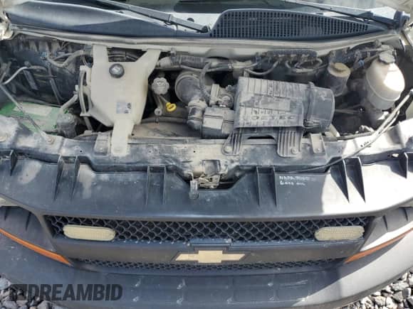 2010 Chevrolet Express Cargo z VIN 1GCZGFBG0A1168619, wystawiony jako Copart lot #69234885 z przebiegiem 212 472 mil mil oraz Szkoda całkowita • Salvage title. Historia ofert i sprzedaży dostępna na DreamBid. Obrazek 12.