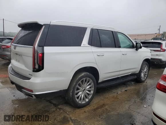 2022 Cadillac Escalade Premium Luxury с VIN 1GYS4BKL3NR164999, выставлен на аукционе Copart как лот 58035295 с пробегом 42 871 миль миль и Списание • Salvage title. История ставок и продаж доступна на DreamBid. Изображение 3.