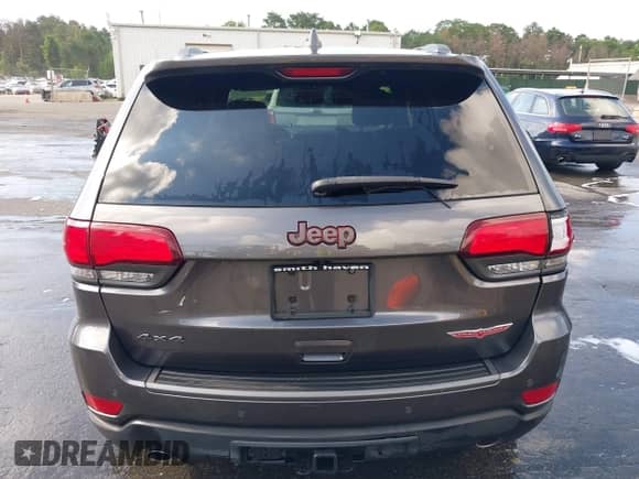 2019 Jeep Grand Cherokee Trailhawk z VIN 1C4RJFLG9KC610318, wystawiony jako IAAI lot #42708465 z przebiegiem 53 924 mil mil oraz . Historia ofert i sprzedaży dostępna na DreamBid. Obrazek 16.