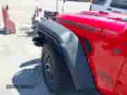 2025 Jeep Wrangler Rubicon z VIN 1C4PJXFN4SW573748, wystawiony jako IAAI lot #42660183 z przebiegiem 763 mil mil oraz . Historia ofert i sprzedaży dostępna na DreamBid. Obrazek 19.