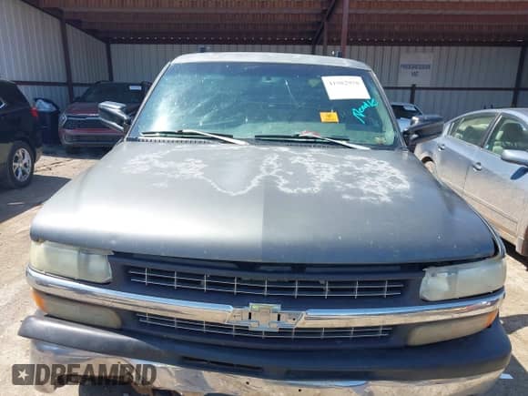 1999 Chevrolet Silverado 2500 LS with VIN 1GCGC29U0XE197465, listed as a IAAI auction lot 41982958 with Not provided miles and . Bid and sale history available at DreamBid. Image 12.