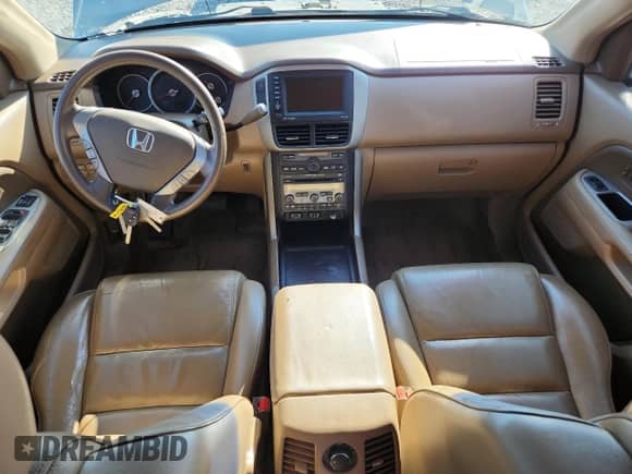 2006 Honda Pilot EX-L z VIN 5FNYF28786B036642, wystawiony jako Copart lot #71314205 z przebiegiem 139 534 mil mil oraz Szkoda całkowita • Salvage title. Historia ofert i sprzedaży dostępna na DreamBid. Obrazek 8.