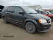 2014 Dodge Grand Caravan SE with VIN 2C4RDGBG7ER287347, listed as a Copart auction lot 69661245 with 238,219 mi miles and Clean title. Bid and sale history available at DreamBid. Image 4.