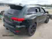 2015 Jeep Grand Cherokee SRT with VIN 1C4RJFDJ8FC768262, listed as a IAAI auction lot 42739805 with 86,840 mi miles and . Bid and sale history available at DreamBid. Image 4.