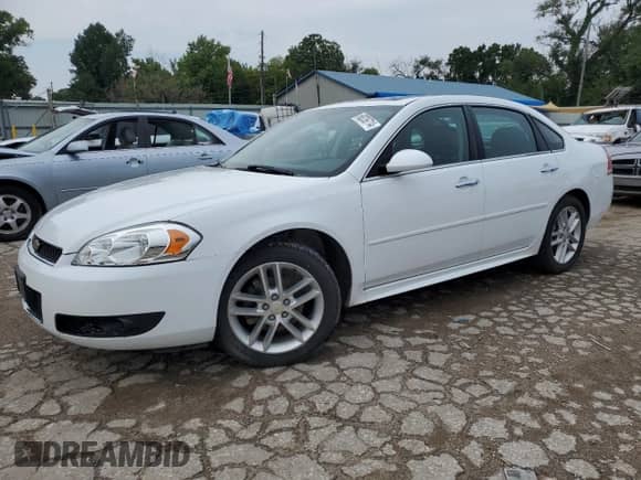 2015 Chevrolet Impala LTZ with VIN 2G1WC5E31F1107551, listed as a Copart auction lot 68236714 with 114,993 mi miles and Salvage title. Bid and sale history available at DreamBid. Image 1.