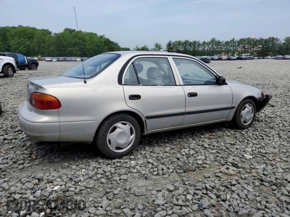 2002 Chevrolet Prizm с VIN 1Y1SK52852Z407762, выставлен на аукционе Copart как лот 59411165 с пробегом Не указан миль и Списание • Salvage title. История ставок и продаж доступна на DreamBid. Изображение 3.