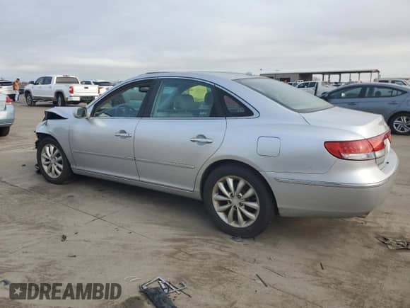 2007 Hyundai Azera SE с VIN KMHFC46F87A211239, выставлен на аукционе Copart как лот 84478194 с пробегом Не указан миль и Списание • Salvage title. История ставок и продаж доступна на DreamBid. Изображение 2.
