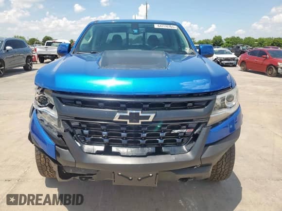 2020 Chevrolet Colorado 4WD ZR2 z VIN 1GCGTEEN6L1104160, wystawiony jako Copart lot #64774765 z przebiegiem 70 683 mil mil oraz Szkoda całkowita • Salvage title. Historia ofert i sprzedaży dostępna na DreamBid. Obrazek 5.