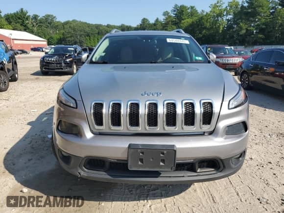 2016 Jeep Cherokee Latitude with VIN 1C4PJMCB2GW100138, listed as a Copart auction lot 64548445 with 211,628 mi miles and Salvage title. Bid and sale history available at DreamBid. Image 5.