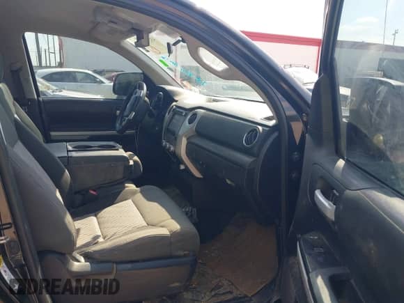 2014 Toyota Tundra SR with VIN 5TFRM5F11EX080643, listed as a IAAI auction lot 43296399 with 247,504 mi miles and . Bid and sale history available at DreamBid. Image 5.