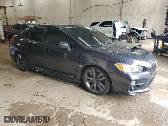 2016 Subaru WRX Premium with VIN JF1VA1E65G8808657, listed as a Copart auction lot 71234275 with 92,762 mi miles and Salvage title. Bid and sale history available at DreamBid. Image 4.