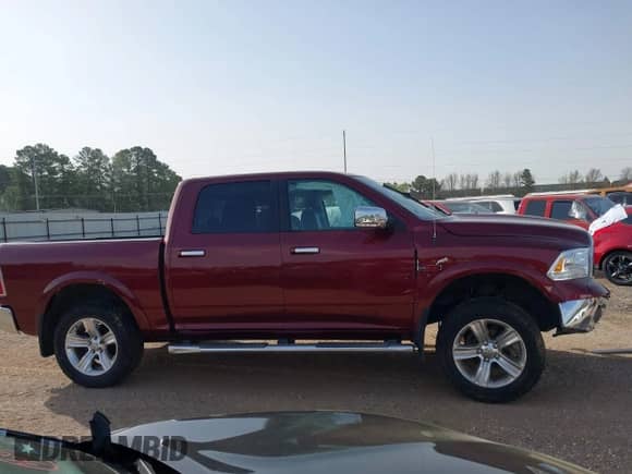 2017 Ram 1500 Laramie with VIN 1C6RR7NM4HS875347, listed as a IAAI auction lot 41826432 with 103,127 mi miles and . Bid and sale history available at DreamBid. Image 13.