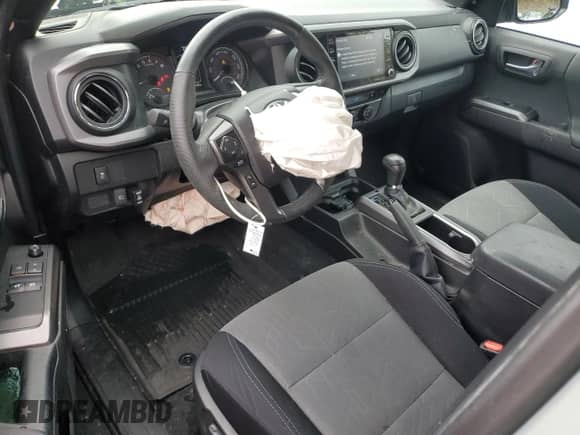 2022 Toyota Tacoma SR z VIN 3TYSZ5AN6NT076787, wystawiony jako Copart lot #86312735 z przebiegiem 22 446 mil mil oraz Szkoda całkowita • Salvage title. Historia ofert i sprzedaży dostępna na DreamBid. Obrazek 8.