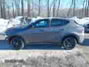 2024 Dodge Hornet R/T Plus z VIN ZACPDFDW1R3A08403, wystawiony jako IAAI lot #41510841 z przebiegiem 2 786 mil mil oraz . Historia ofert i sprzedaży dostępna na DreamBid. Obrazek 14.