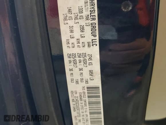 2013 Dodge Grand Caravan SXT with VIN 2C4RDGCGXDR718759, listed as a Copart auction lot 68687345 with 196,834 mi miles and Salvage title. Bid and sale history available at DreamBid. Image 13.