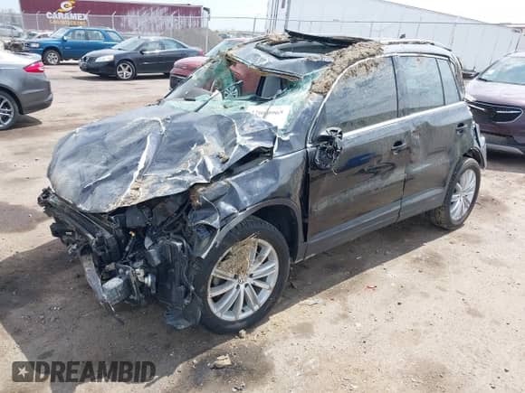 2011 Volkswagen Tiguan S with VIN WVGAV7AX4BW506582, listed as a IAAI auction lot 42080965 with Not provided miles and . Bid and sale history available at DreamBid. Image 2.