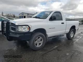 2007 Dodge 1500 ST with VIN 1D7HU16N97J512205, listed as a Copart auction lot 49686935 with 157,371 mi miles and Salvage title. Bid and sale history available at DreamBid. Image 1.