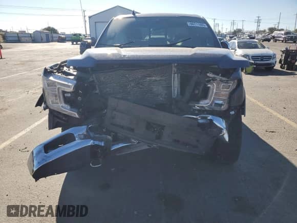 2020 Ford F-150 XLT с VIN 1FTEW1E45LFB79014, выставлен на аукционе Copart как лот 80711485 с пробегом Не указан миль и Списание • Salvage title. История ставок и продаж доступна на DreamBid. Изображение 5.