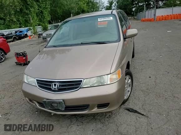 2004 Honda Odyssey EX с VIN 5FNRL18634B118452, выставлен на аукционе Copart как лот 64486285 с пробегом 195 205 миль миль и Списание • Salvage title. История ставок и продаж доступна на DreamBid. Изображение 14.