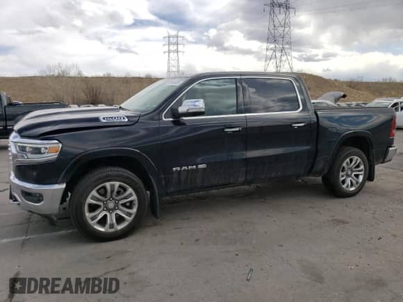 2020 Ram 1500 Longhorn with VIN 1C6SRFKT5LN220743, listed as a Copart auction lot 50660925 with 58,167 mi miles and Salvage title. Bid and sale history available at DreamBid. Image 1.