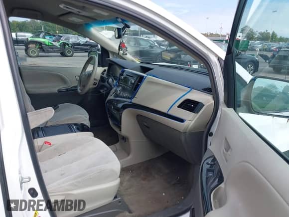 2013 Toyota Sienna LE AAS with VIN 5TDKK3DC3DS308565, listed as a IAAI auction lot 43281154 with 221,342 mi miles and . Bid and sale history available at DreamBid. Image 5.