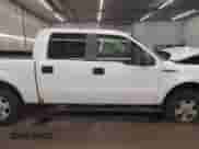 2014 Ford F-150 XLT with VIN 1FTFW1EF4EKG05646, listed as a IAAI auction lot 42948018 with 254,460 mi miles and . Bid and sale history available at DreamBid. Image 14.