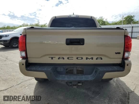 2018 Toyota Tacoma SR5 с VIN 3TMAZ5CN6JM078277, выставлен на аукционе Copart как лот 81998625 с пробегом 74 755 миль миль и Списание • Salvage title. История ставок и продаж доступна на DreamBid. Изображение 6.