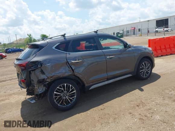 2021 Hyundai Tucson Ultimate with VIN KM8J3CALXMU338909, listed as a IAAI auction lot 42545582 with 31,059 mi miles and . Bid and sale history available at DreamBid. Image 4.